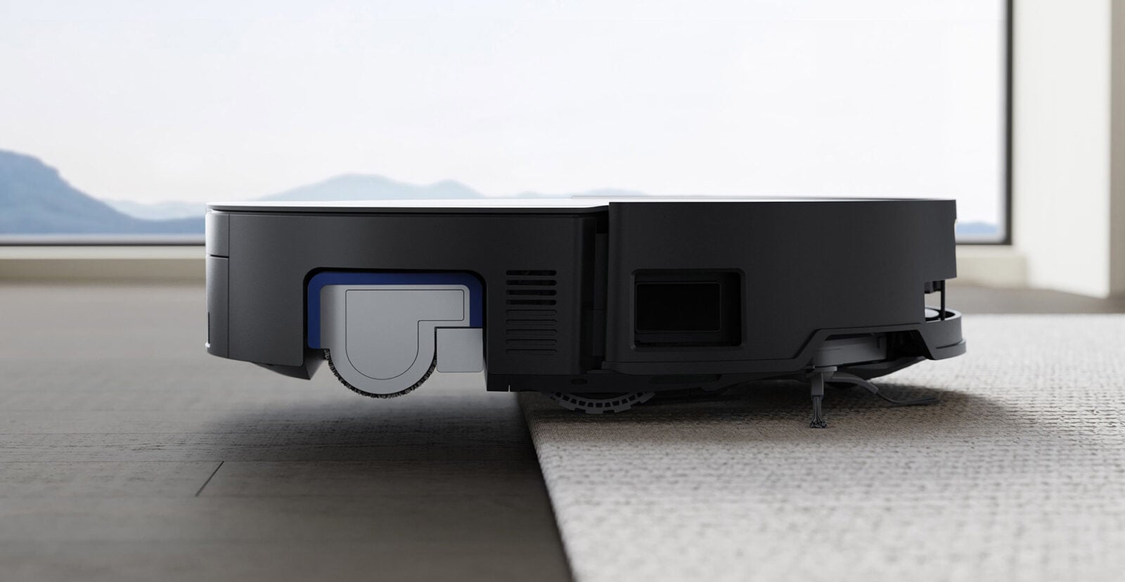 Ecovacs Deebot X8 Pro Omni podnosi rolkę mopa, zanim wjedzie na dywan