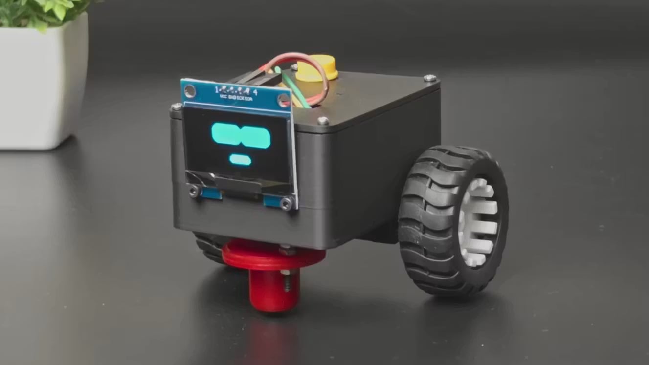 Mały robot jeździ po biurku i czeka na dotyk. Dziwne? Trochę. Sympatyczne? Bardzo