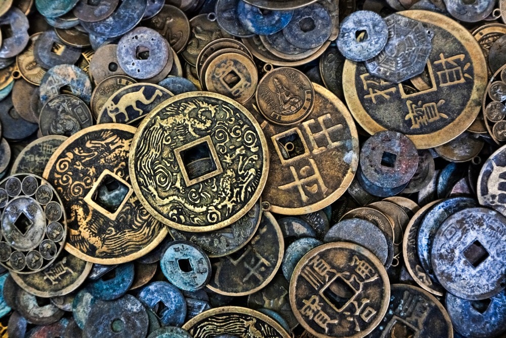 Historia pieniądza: od pierwszych monet do płacenia bez gotówki